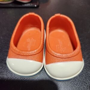 Our generation orange slip on shoes for 18" dolls